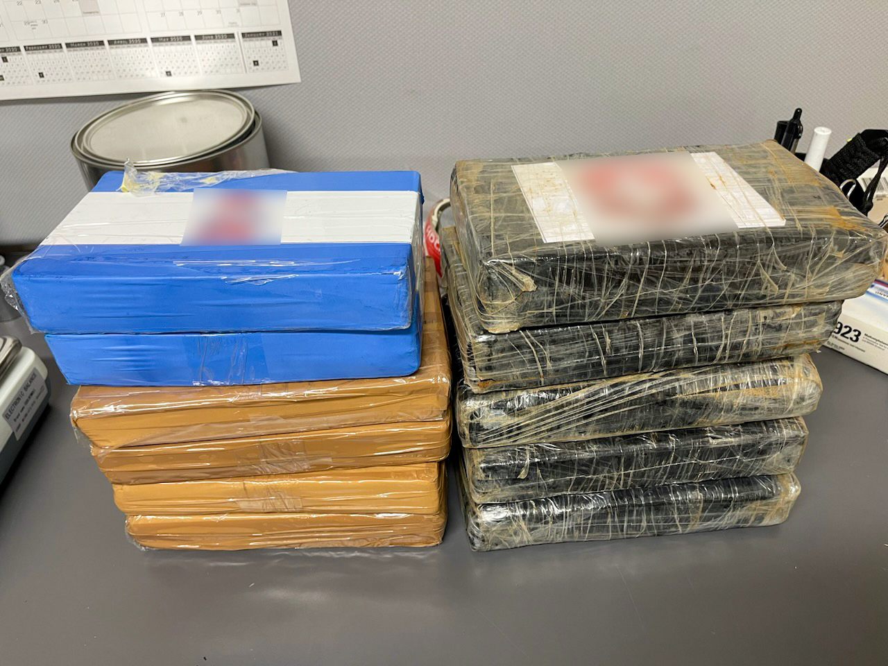 14.25 pounds of fentanyl powder and 12.55 pounds of cocaine