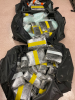Three black duffle bags filled with wrapped bundles of fentanyl 