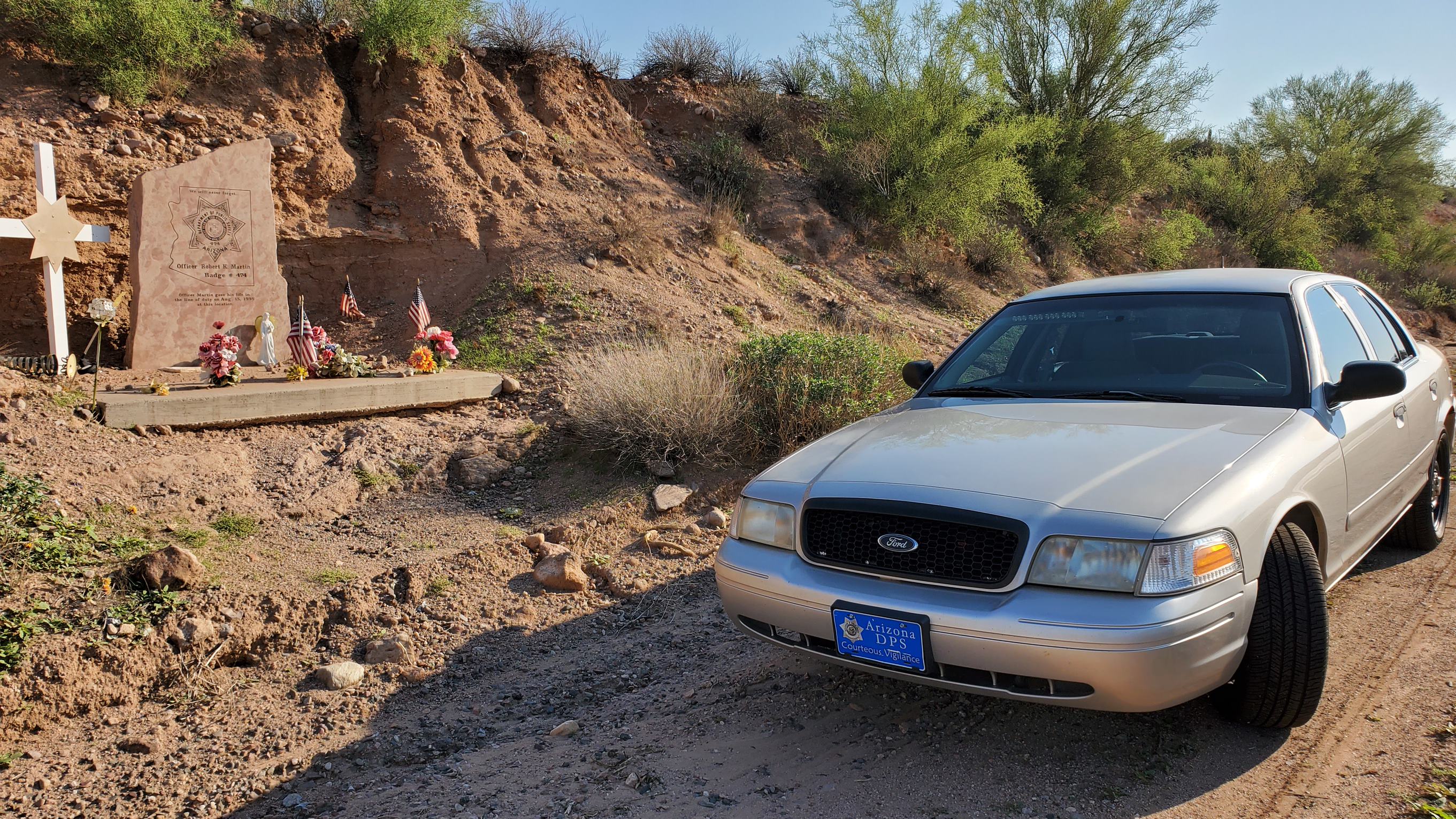 Crown victoria at roadside memorial