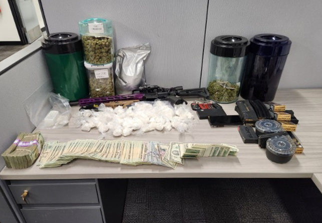 Drugs, weapons and cash seized