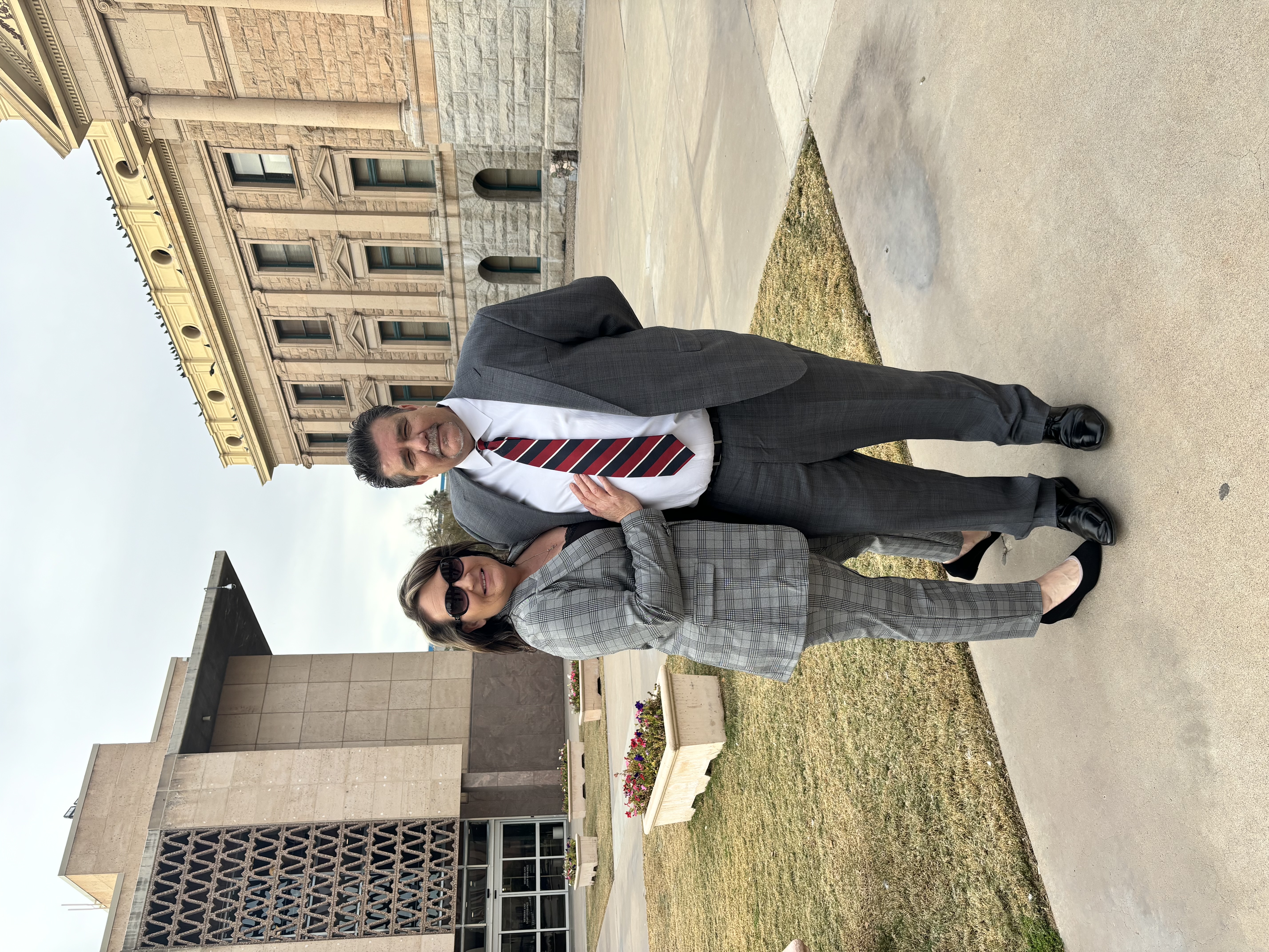 Jody Winters and her husband pose for a photo outside the Arizona State Capitol, where she spoke in support of Bentley's Law