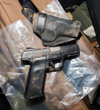 Dirt-covered handgun