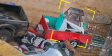 Skid steer bobcat in an open trailer
