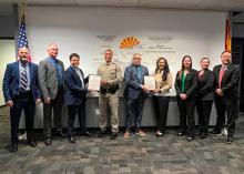 Representatives from the AZ Governor's Office present the ACTIC staff and AZDPS Director Glover with a commendation for the ACTIC 20th anniversary