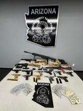 Weapons seized by the Arizona Vehicle Theft Task Force as part of Operation Escalading Switch.