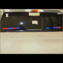 The suspect's F-150 pickup truck equipped with red and blue lights