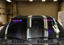The suspect's F-150 pickup truck equipped with red and blue lights