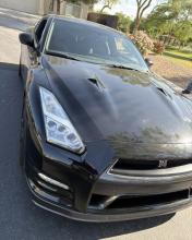 A photo of the front of a black Nissan GT-R coupe seized by VTTF detectives