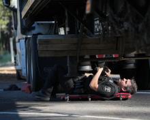 Trooper conducting a CMV inspection during International Roadcheck