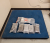 Suspected fentanyl bundles on a scale