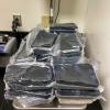 Several plastic wrapped packages of methamphetamine on a scale