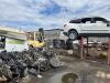 Property yard filled with vehicles and vehicle parts
