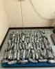 A photo of plastic-wrapped packages of methamphetamine laid out on a scale